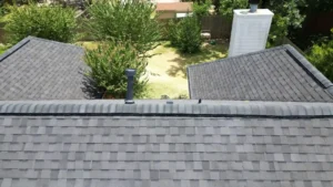 austin texas property with shingles installed on roof
