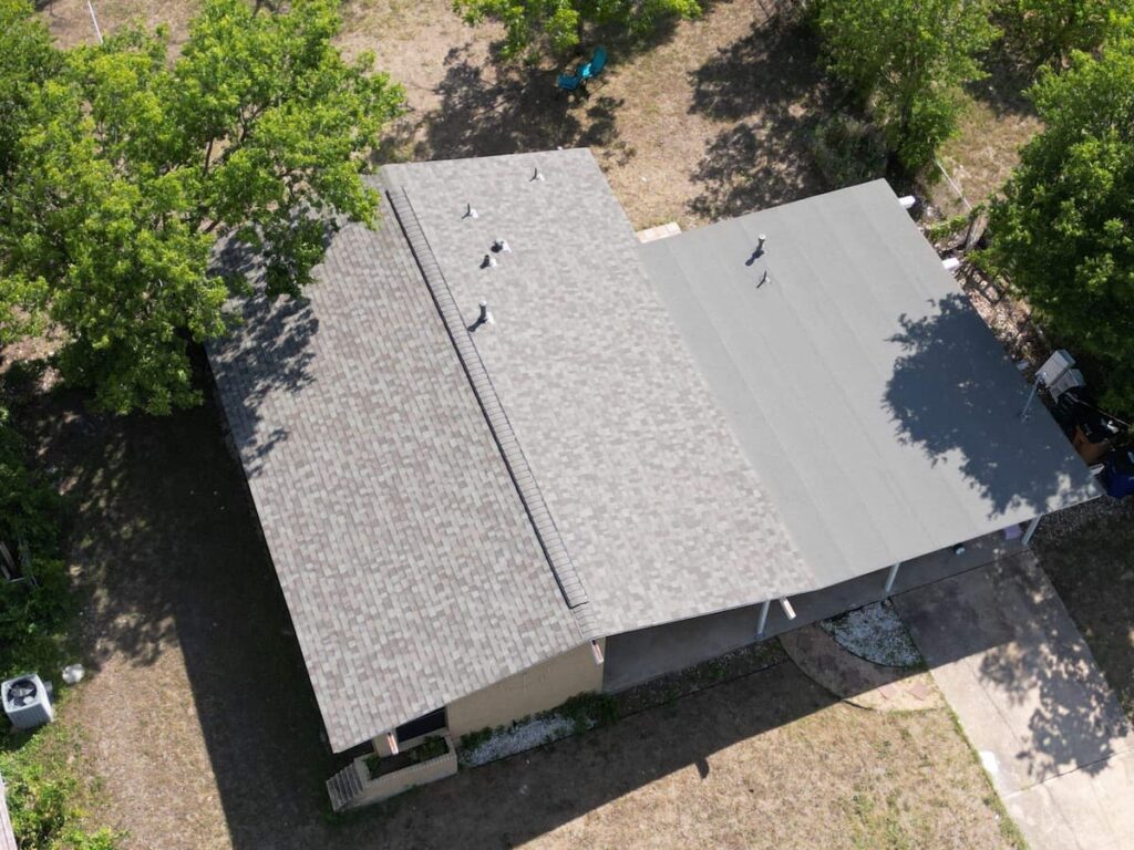 RoofsOnly.com roofing inspector documenting hail damage for insurance claim in Pflugerville Texas
