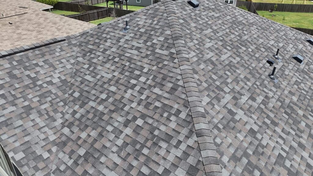 Architectural shingle roof installed by RoofsOnly.com on a home in Manor Texas