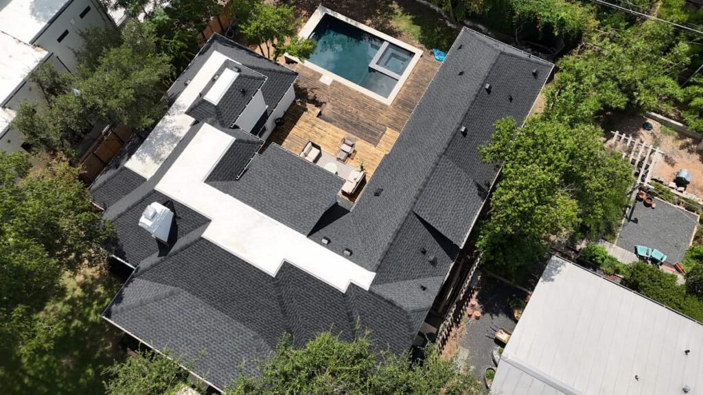 Architectural shingle roof matching historic district requirements on a home in Travis Heights Austin Texas