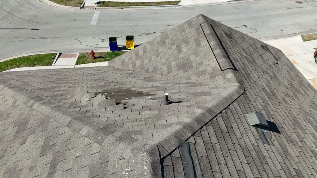RoofsOnly.com inspector reviewing roof condition on a newer home in Manor Texas