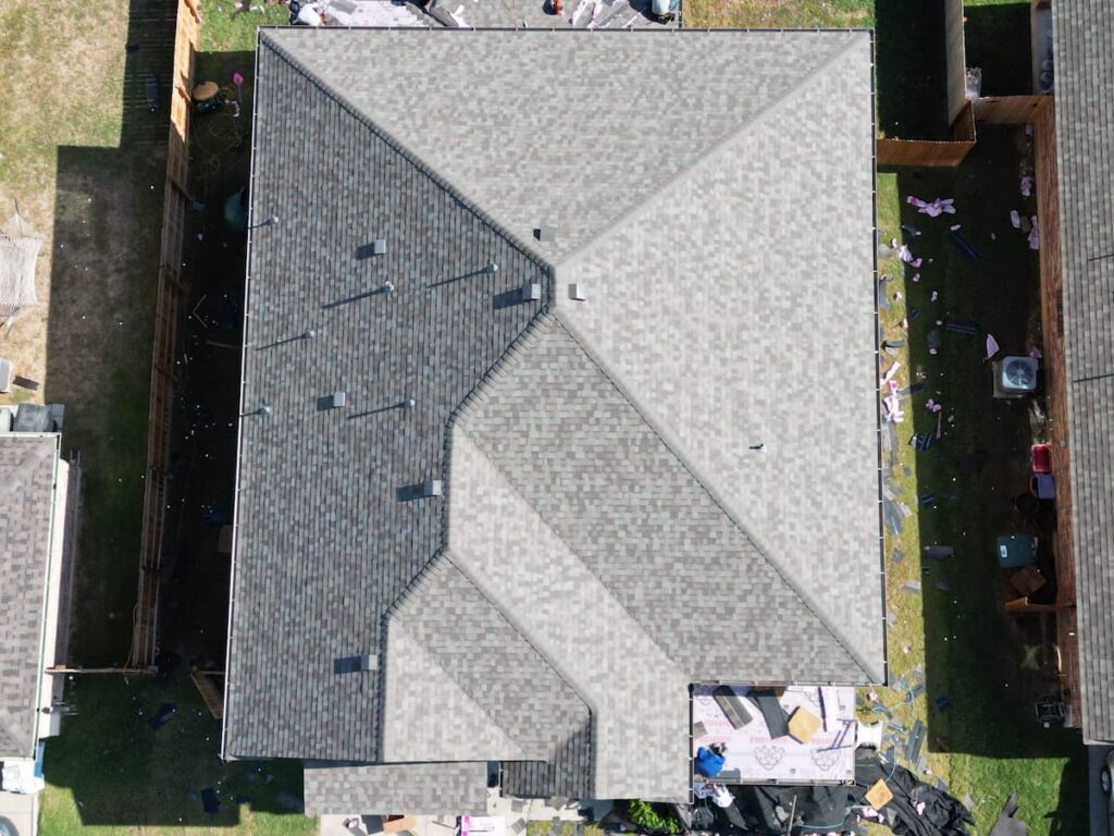 RoofsOnly.com inspector reviewing roof completion on a home in Salado Texas