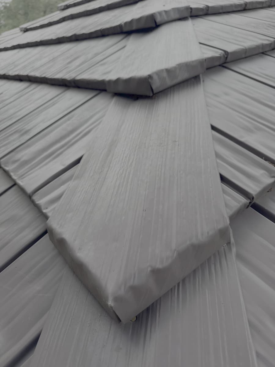 Completed stone-coated steel roof replacement on an Austin Texas home by RoofsOnly.com