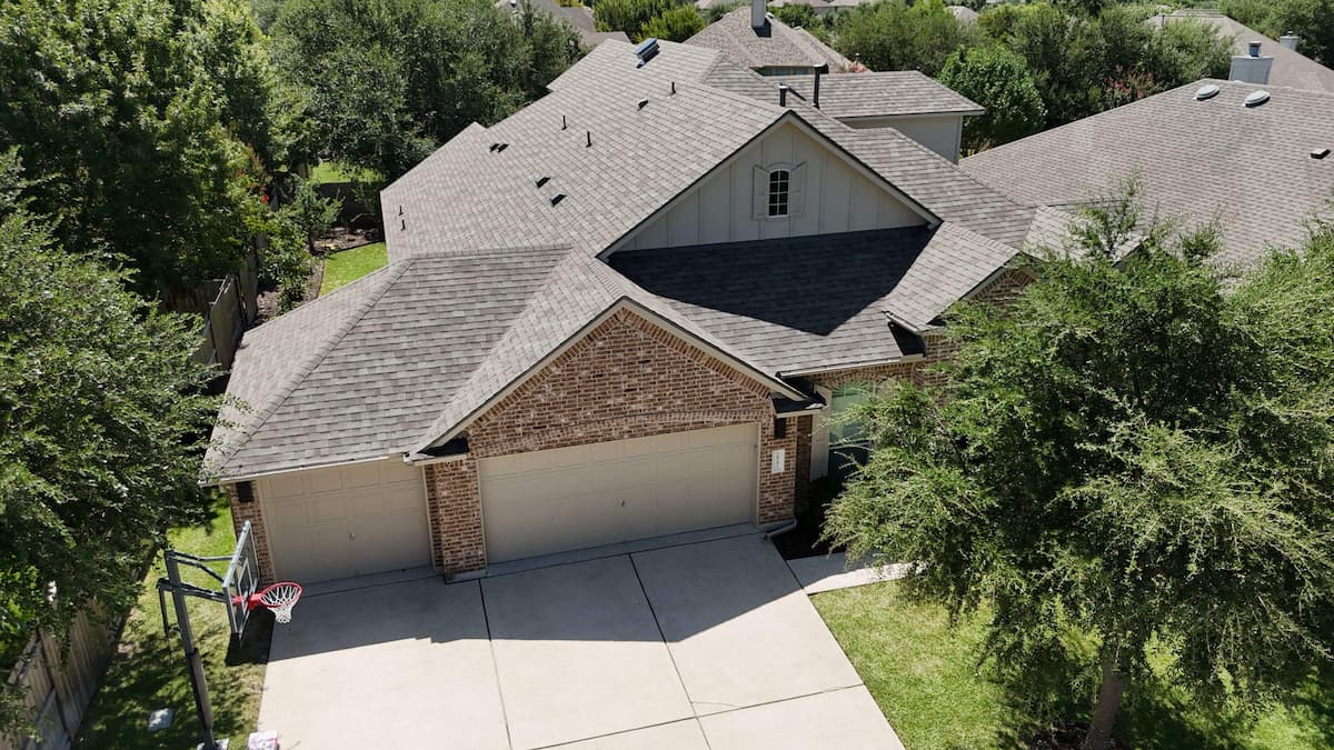 Completed architectural shingle roof replacement on a Driftwood TX home