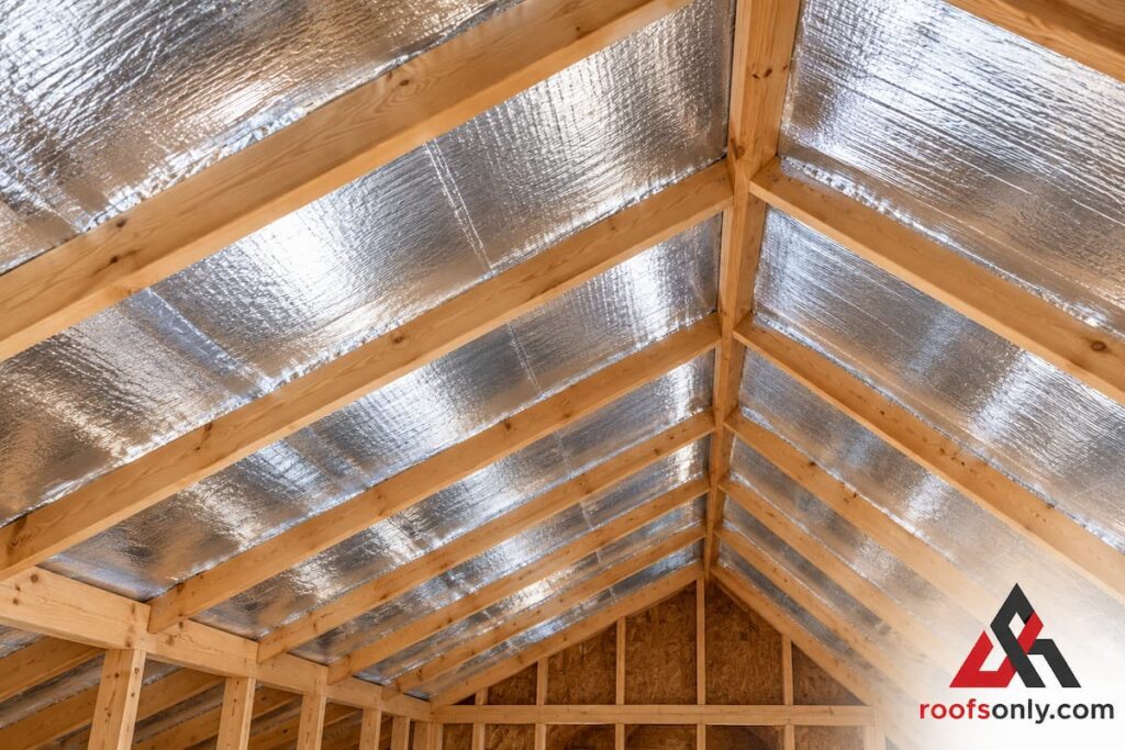 Radiant barrier material installed under roof deck in Austin attic